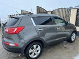 Kia Sportage 2013 года за 7 000 000 тг. в Атырау – фото 3