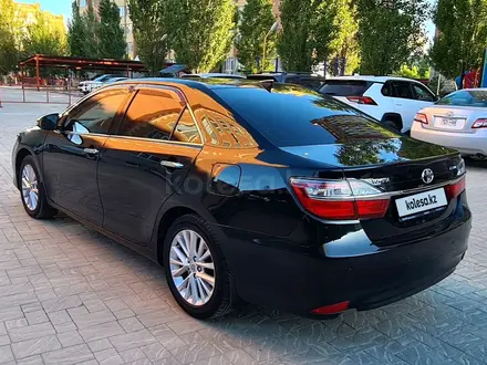 Toyota Camry 2015 года за 10 800 000 тг. в Актобе – фото 6