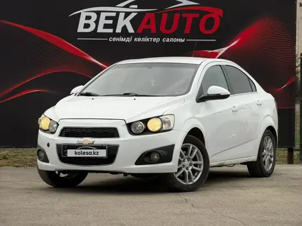 Chevrolet Aveo 2013 года за 3 800 000 тг. в Караганда – фото 2