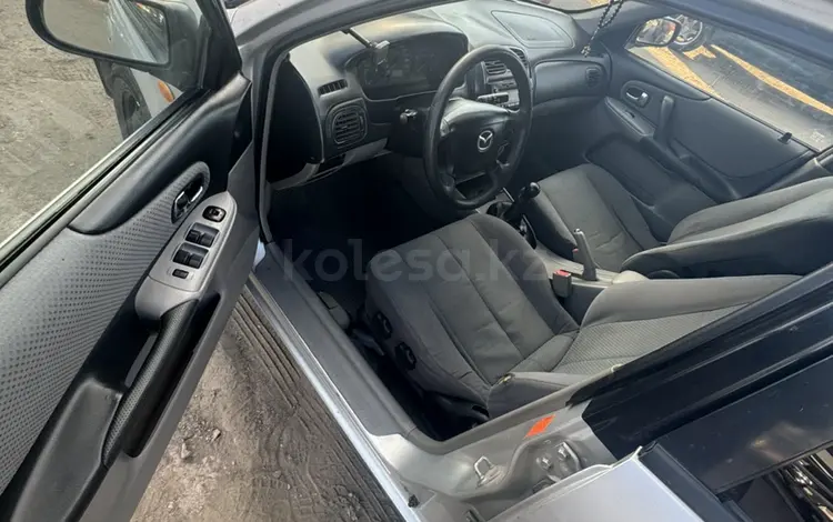 Mazda 323 2002 годаүшін1 750 000 тг. в Караганда