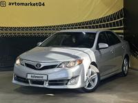 Toyota Camry 2014 года за 9 500 000 тг. в Актобе