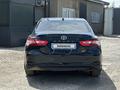 Toyota Camry 2019 года за 9 900 000 тг. в Актобе – фото 9