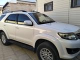 Toyota Fortuner 2014 года за 11 228 571 тг. в Жанаозен – фото 2