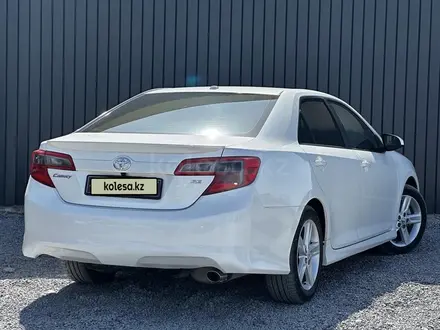 Toyota Camry 2012 года за 8 770 000 тг. в Актобе – фото 4