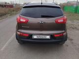 Kia Sportage 2013 года за 6 600 000 тг. в Караганда – фото 2