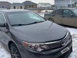 Toyota Camry 2014 года за 6 300 000 тг. в Атырау