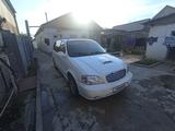 Kia Carnival 2001 года за 2 200 000 тг. в Шымкент – фото 2