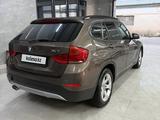 BMW X1 2014 года за 4 000 000 тг. в Жанаозен – фото 2