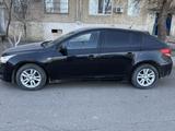 Chevrolet Cruze 2013 года за 3 800 000 тг. в Атырау – фото 2