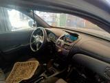 Nissan Almera 2005 года за 1 300 000 тг. в Актобе – фото 2