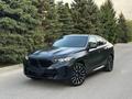 BMW X6 2023 года за 59 700 000 тг. в Алматы
