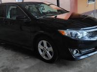 Toyota Camry 2013 годаүшін6 400 000 тг. в Шымкент