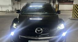 Mazda CX-7 2011 года за 4 100 000 тг. в Астана