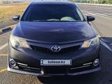 Toyota Camry 2014 годаүшін7 300 000 тг. в Актобе – фото 2