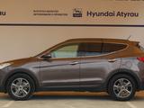 Hyundai Santa Fe 2014 годаүшін8 600 000 тг. в Атырау – фото 3