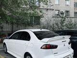 Mitsubishi Lancer 2014 года за 4 800 000 тг. в Актобе – фото 2