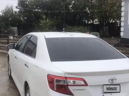 Toyota Camry 2012 года за 6 700 000 тг. в Атырау