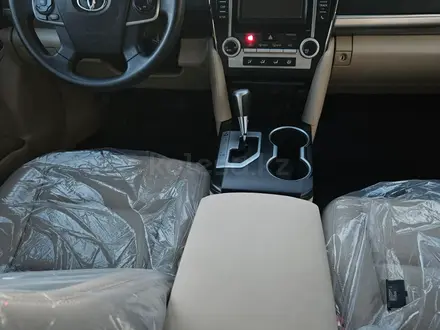 Toyota Camry 2014 года за 9 000 000 тг. в Жанаозен – фото 10