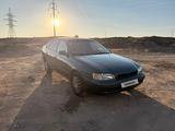 Toyota Carina E 1997 года за 1 900 000 тг. в Конаев (Капшагай) – фото 2