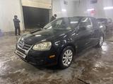 Volkswagen Jetta 2010 года за 4 500 000 тг. в Астана – фото 4