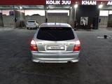 Mazda 323 2001 года за 2 100 000 тг. в Шымкент – фото 4