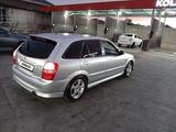 Mazda 323 2001 года за 2 100 000 тг. в Шымкент – фото 5