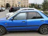 Mazda 323 1994 года за 500 000 тг. в Астана – фото 4