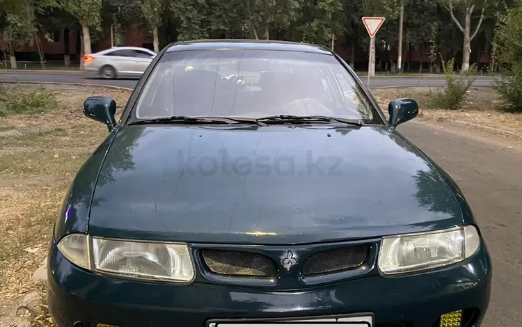 Mitsubishi Carisma 1996 годаүшін1 250 000 тг. в Тараз