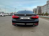 BMW 750 2015 года за 18 000 000 тг. в Астана – фото 2