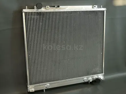 Радиатор алюминиевый MMC Delica 4m40 40мм AT AJS за 91 317 тг. в Алматы