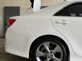 Toyota Camry 2014 года за 5 700 000 тг. в Жанаозен