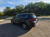 Hyundai Santa Fe 2023 годаfor18 000 000 тг. в Караганда