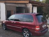 Kia Carnival 2003 года за 2 200 000 тг. в Арысь – фото 5