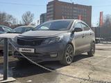 Kia Rio 2015 года за 4 090 000 тг. в Актобе – фото 2