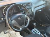 Kia Rio 2015 года за 4 090 000 тг. в Актобе – фото 5