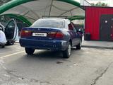 Mazda 323 1995 года за 1 100 000 тг. в Алматы – фото 5