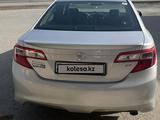 Toyota Camry 2013 года за 8 700 000 тг. в Атырау – фото 2