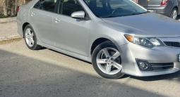 Toyota Camry 2013 года за 8 700 000 тг. в Атырау