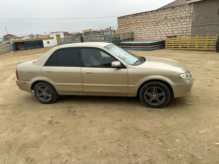 Mazda 323 2001 года за 2 500 000 тг. в Актау – фото 4