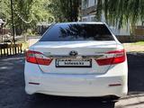 Toyota Camry 2014 годаүшін7 700 000 тг. в Алматы – фото 3