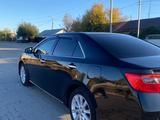 Toyota Camry 2013 года за 8 250 000 тг. в Караганда