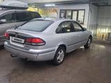 Mazda 626 1999 года за 1 800 000 тг. в Алматы – фото 4