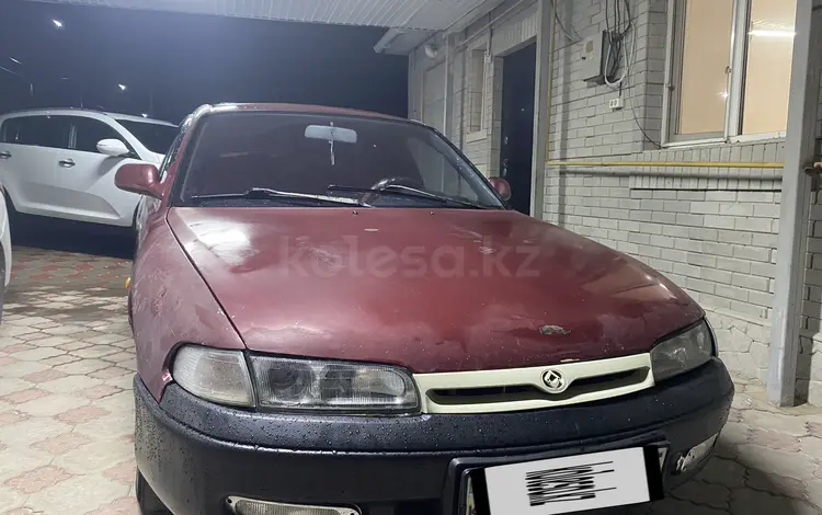 Mazda Cronos 1992 года за 650 000 тг. в Алматы