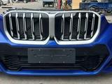 Передний бампер BMW X1 U11 за 1 101 тг. в Шымкент