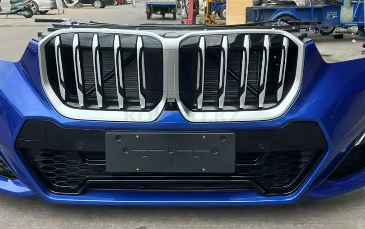 Передний бампер BMW X1 U11 за 1 101 тг. в Шымкент