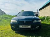 Mazda 626 1997 года за 1 800 000 тг. в Урджар – фото 2