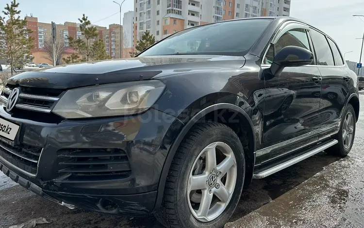 Volkswagen Touareg 2012 года за 11 990 000 тг. в Астана