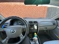 Mazda 626 1998 года за 2 300 000 тг. в Актобе – фото 17