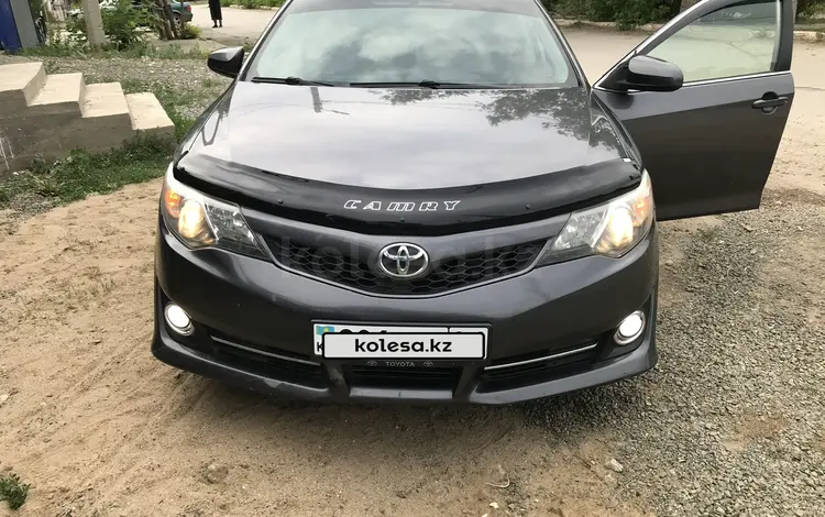 Toyota Camry 2014 года за 7 300 000 тг. в Актобе