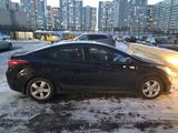 Hyundai Elantra 2013 года за 4 700 000 тг. в Астана – фото 2